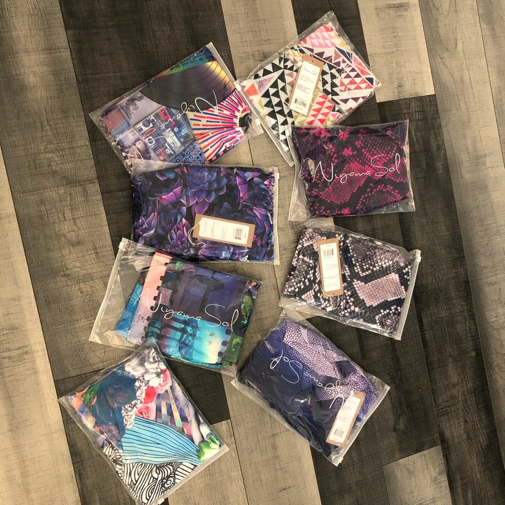 Bundle of 8 brand new Niyama Sol leggings, size L